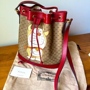 Gucci Doraemon bucket bag with dust bag